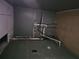 Unfinished basement with exposed pipes and concrete floor at 2670 Foxlair Trl, South Fulton, GA 30349