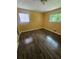 Bedroom featuring hardwood floors and sunlit windows at 2670 Foxlair Trl, South Fulton, GA 30349