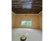 Bright bedroom featuring a wood ceiling and natural light from a window at 2670 Foxlair Trl, South Fulton, GA 30349
