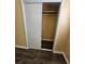 Bedroom closet with sliding doors and shelves at 2670 Foxlair Trl, South Fulton, GA 30349