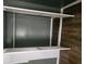 This is a closet with built-in shelving and wood floors at 2670 Foxlair Trl, South Fulton, GA 30349