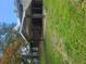 Charming home exterior featuring a covered porch with decorative iron railings at 2670 Foxlair Trl, South Fulton, GA 30349