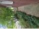 Close up of home's exterior showing walkway and side garden at 2670 Foxlair Trl, South Fulton, GA 30349