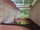 Arched entryway with brick trim, patterned tile flooring, and a view to the outdoors at 2670 Foxlair Trl, South Fulton, GA 30349