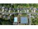 Aerial view showcasing neighborhood amenities including pool, tennis courts, and playground at 4517 Baker Grove Nw Rd, Acworth, GA 30101