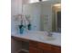 Bathroom with large mirror over vanity and a white counter top at 4517 Baker Grove Nw Rd, Acworth, GA 30101
