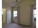 Bedroom with carpeted floor, windows with curtains, and neutral walls at 4517 Baker Grove Nw Rd, Acworth, GA 30101