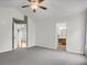 Bedroom view with open doorway to kitchen and another room featuring neutral colors at 4517 Baker Grove Nw Rd, Acworth, GA 30101