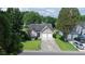 Charming home with a well-maintained lawn, a two-car garage, and a welcoming front entrance at 4517 Baker Grove Nw Rd, Acworth, GA 30101