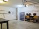 Spacious garage with ample storage and a work area at 4517 Baker Grove Nw Rd, Acworth, GA 30101