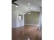 Open-concept living room featuring hardwood floors and neutral paint at 4517 Baker Grove Nw Rd, Acworth, GA 30101