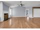 Bright living room with fireplace, hardwood floors, ceiling fan and modern finishes at 4517 Baker Grove Nw Rd, Acworth, GA 30101