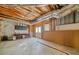 Unfinished basement with exposed wood framework, ductwork, and concrete walls, offering customizable space at 1360 Wilmington Way, Grayson, GA 30017