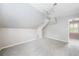 Upstairs bonus room featuring new carpet, fresh paint and a window with natural light at 1360 Wilmington Way, Grayson, GA 30017