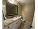 Bright bathroom features granite vanity, tile floors, and tub-shower combo at 1610 Sprayberry Dr, Marietta, GA 30066