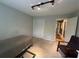 Neutral bedroom featuring track lighting, and a chair near closet doors at 1610 Sprayberry Dr, Marietta, GA 30066