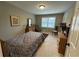 Cozy bedroom with closet, window, and neutral decor at 1610 Sprayberry Dr, Marietta, GA 30066