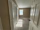 Bedroom showing spacious closet with white shutter style doors and natural light at 1610 Sprayberry Dr, Marietta, GA 30066