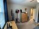 Bright bedroom with large window, wooden dresser, and unique coat rack at 1610 Sprayberry Dr, Marietta, GA 30066