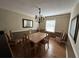 Inviting dining room features a chandelier and seating for six at 1610 Sprayberry Dr, Marietta, GA 30066