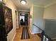 Lovely hallway features hardwood floors and leads to the living room at 1610 Sprayberry Dr, Marietta, GA 30066