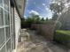 Private outdoor patio area with a brick wall, offering a serene space for relaxation and entertaining at 1610 Sprayberry Dr, Marietta, GA 30066
