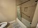 Tiled shower-tub combination with shower curtain and safety hand rail at 1610 Sprayberry Dr, Marietta, GA 30066
