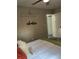 bedroom with single bed, shelf, window, and adventure wall decor at 539 Rue Montaigne, Stone Mountain, GA 30083