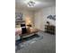 Cozy bedroom features neutral decor, artwork, and comfortable seating bench at 539 Rue Montaigne, Stone Mountain, GA 30083