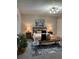 Well-appointed bedroom with a rug, decorative pillows, and a stylish accent bench at 539 Rue Montaigne, Stone Mountain, GA 30083