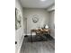 Inviting office with modern wood desk, laminate flooring, and stylish decor at 539 Rue Montaigne, Stone Mountain, GA 30083