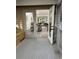 View from the porch through glass doors to the living room; neutral colors and modern feel at 539 Rue Montaigne, Stone Mountain, GA 30083
