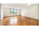 Living room featuring beautiful parquet floors and a bright window at 2965 Pharr Nw Ct # 714, Atlanta, GA 30305