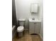 Functional bathroom with modern vanity, standard toilet, and minimal decor at 210 Ormond Sw St, Atlanta, GA 30315