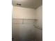 Interior of a walk-in closet with white walls and wire shelving at 210 Ormond Sw St, Atlanta, GA 30315