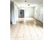 Spacious living area with tile floors and ample lighting, great for entertaining guests at 210 Ormond Sw St, Atlanta, GA 30315