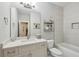 Bathroom featuring modern vanity with ample counter space, tub, and a large mirror at 215 Arizona Ne Ave # 3, Atlanta, GA 30307