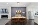 Bright dining room features modern lighting, dark hardwood floors, and a fireplace at 215 Arizona Ne Ave # 3, Atlanta, GA 30307