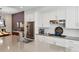 Kitchen featuring white cabinets, stainless appliances, and a large island with hardwood floors at 215 Arizona Ne Ave # 3, Atlanta, GA 30307