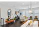 Open-concept living area with hardwood floors, fireplace, and ample natural light at 215 Arizona Ne Ave # 3, Atlanta, GA 30307