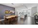 Open concept layout with dining, kitchen, and living area with hardwood floors at 215 Arizona Ne Ave # 3, Atlanta, GA 30307