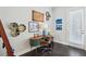 Well-lit home office featuring a unique desk, stylish decor, and access to a private outdoor space at 215 Arizona Ne Ave # 3, Atlanta, GA 30307