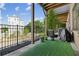 Outdoor patio with artificial turf, potted plants, and a view of the neighborhood at 215 Arizona Ne Ave # 3, Atlanta, GA 30307