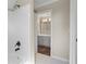 Clean and bright bathroom with a shower-tub combo, and modern fixtures at 410 Hickory Fairway Ct, Woodstock, GA 30188