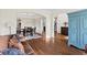 Open-concept living space showcasing a dining area, kitchen and staircase at 410 Hickory Fairway Ct, Woodstock, GA 30188