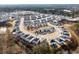 Aerial view of a neighborhood showcasing modern homes and well-planned street layout at 4798 Red Lion Pl, Lawrenceville, GA 30044