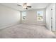 Bedroom with neutral carpet and bright, natural light at 4798 Red Lion Pl, Lawrenceville, GA 30044