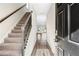 Entryway of a home with hardwood floors and a staircase at 4798 Red Lion Pl, Lawrenceville, GA 30044