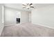 Spacious main bedroom with neutral carpet and an ensuite bathroom at 4798 Red Lion Pl, Lawrenceville, GA 30044