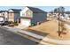 A view of the side of the house and the lawn space with a streetlight at 4798 Red Lion Pl, Lawrenceville, GA 30044